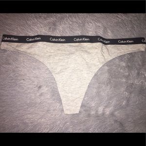 NWOT CALVIN KLEIN GRAY THONG IN SIZE LARGE